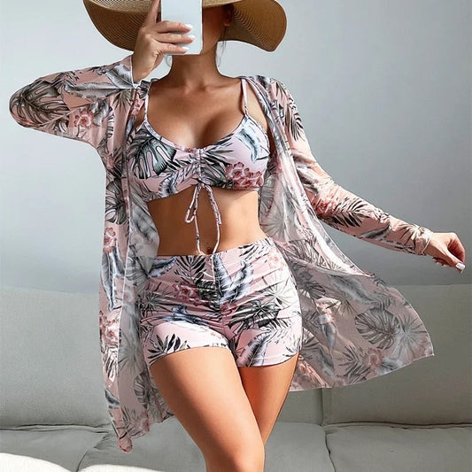 LP | Costume da bagno con motivo a volute e sovrapposizioni