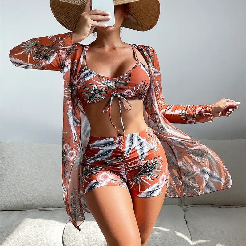 LP | Costume da bagno con motivo a volute e sovrapposizioni