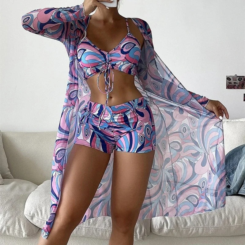 LP | Costume da bagno con motivo a volute e sovrapposizioni